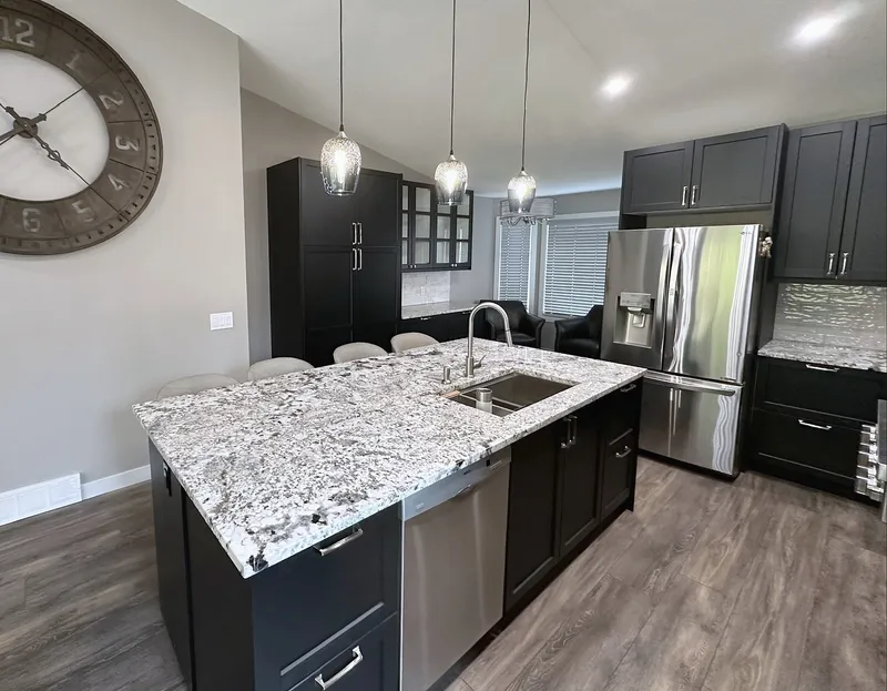 Harvest Hills island with integrated sink and pendant lighting