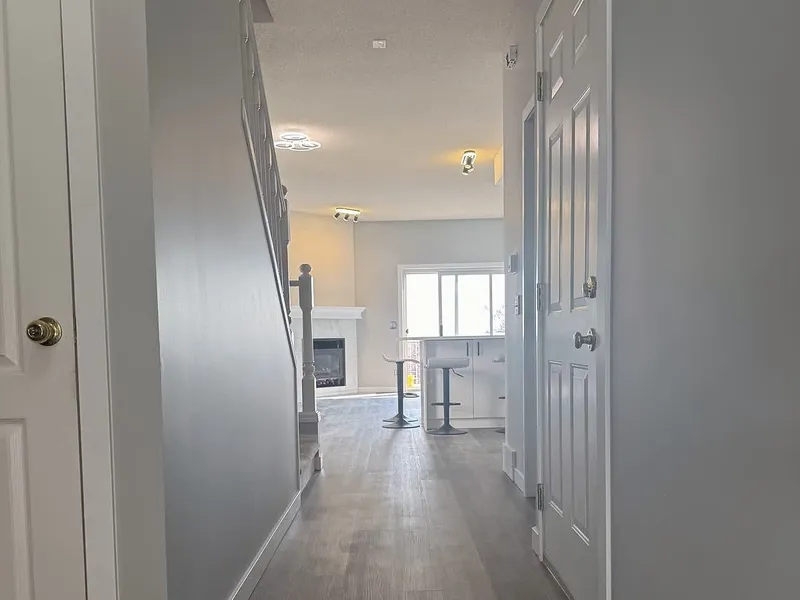 Hallway opening onto the renovated Hamptons kitchen
