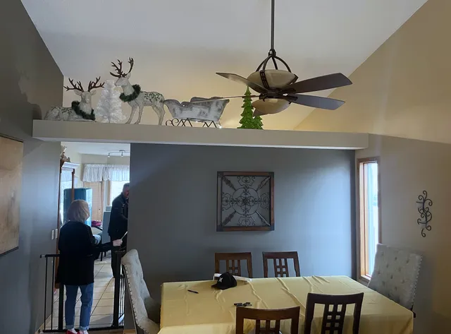 Original Harvest Hills dining space with a partial-height kitchen partition