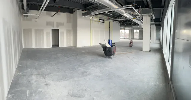 Open commercial shell before the Social Beauty Studios salon build-out