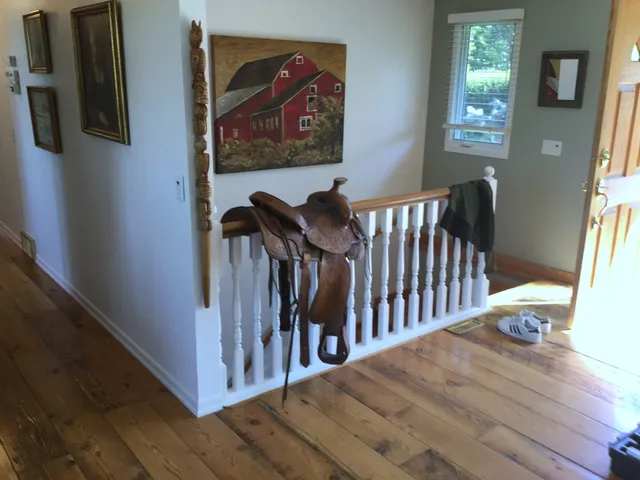 Original wood spindle stair railing in the Artists View entry
