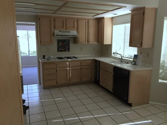 Original enclosed kitchen layout before the Calgary renovation