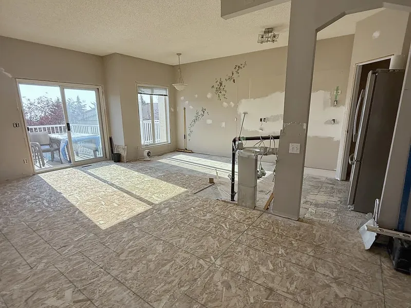 Hamptons main floor during demolition with exposed subfloor