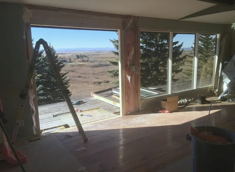 Artists View window wall during construction with exposed framing