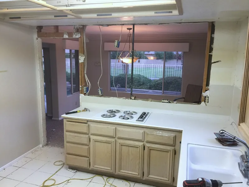 Exposed ceiling and kitchen cabinetry during the Palm Springs work