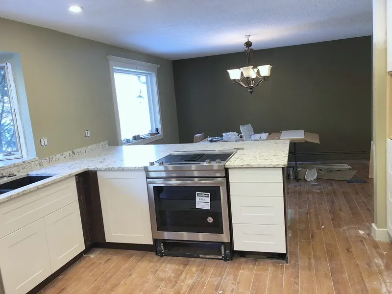 New Edgemont cabinetry and counters before final finishing